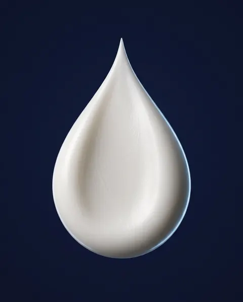 Goutte de lait blanc et lisse.